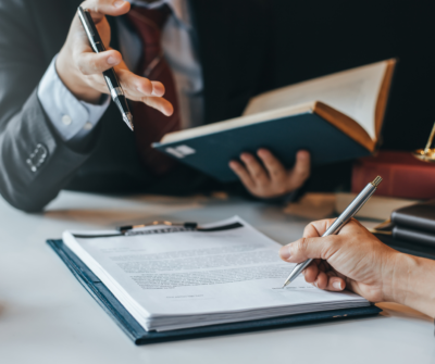 person signing a contract