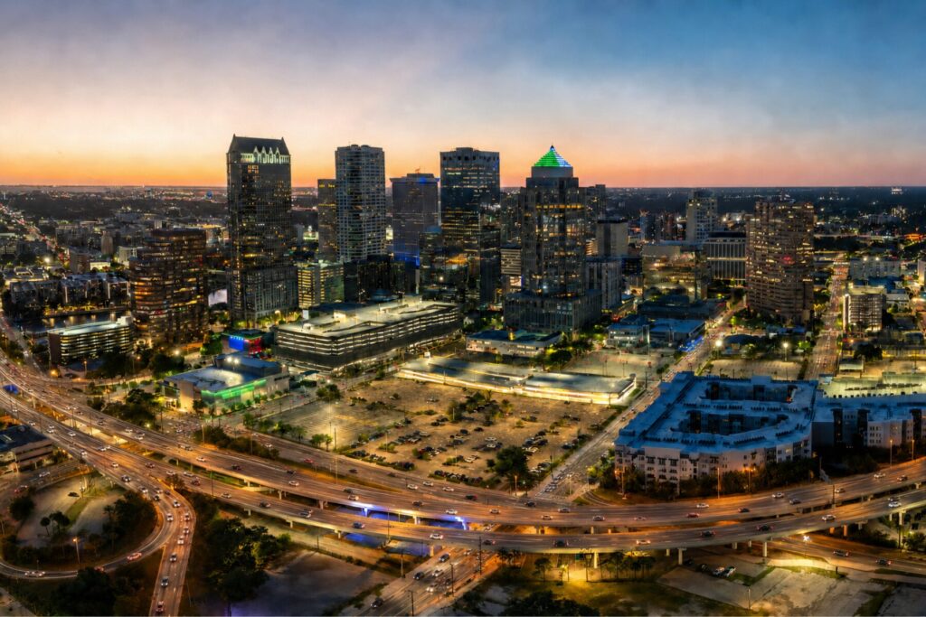 Aerial view of downtown Tampa at dusk showing the busy highways where Tampa car accidents frequently happen