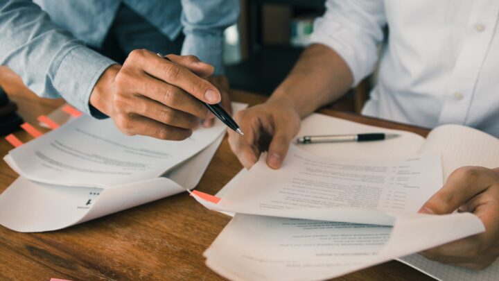 Federal employee reviewing documents during the EEO complaint process